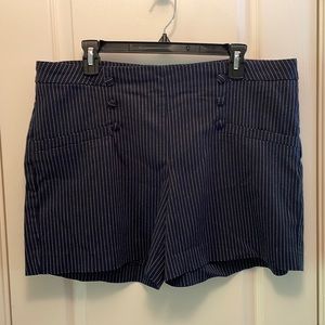 Navy shorts with white pin stripes